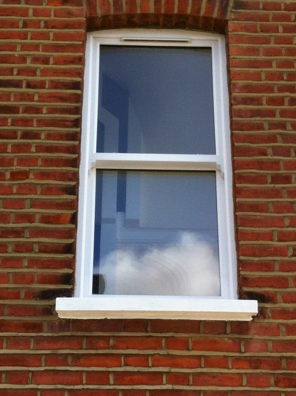 uPVC sash window on Victorian red brick house in Ascot